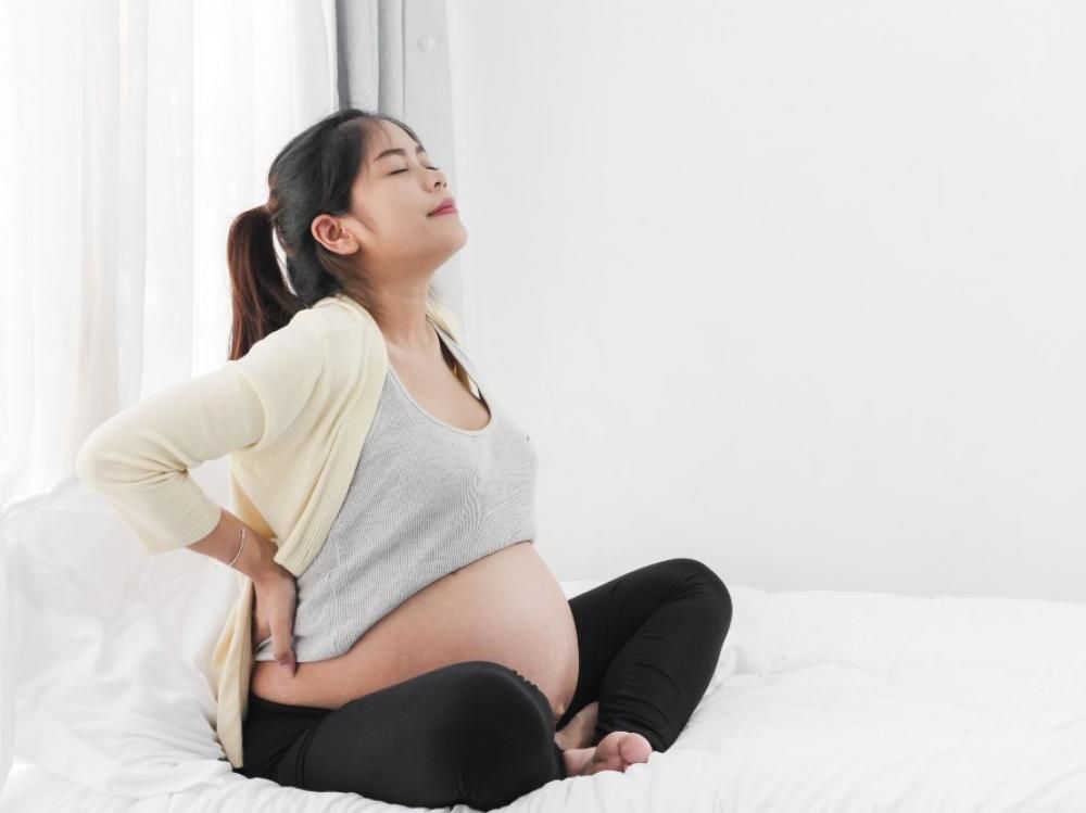 4 cauze ale durerilor de spate în timpul sarcinii și 7 moduri de a o depăși